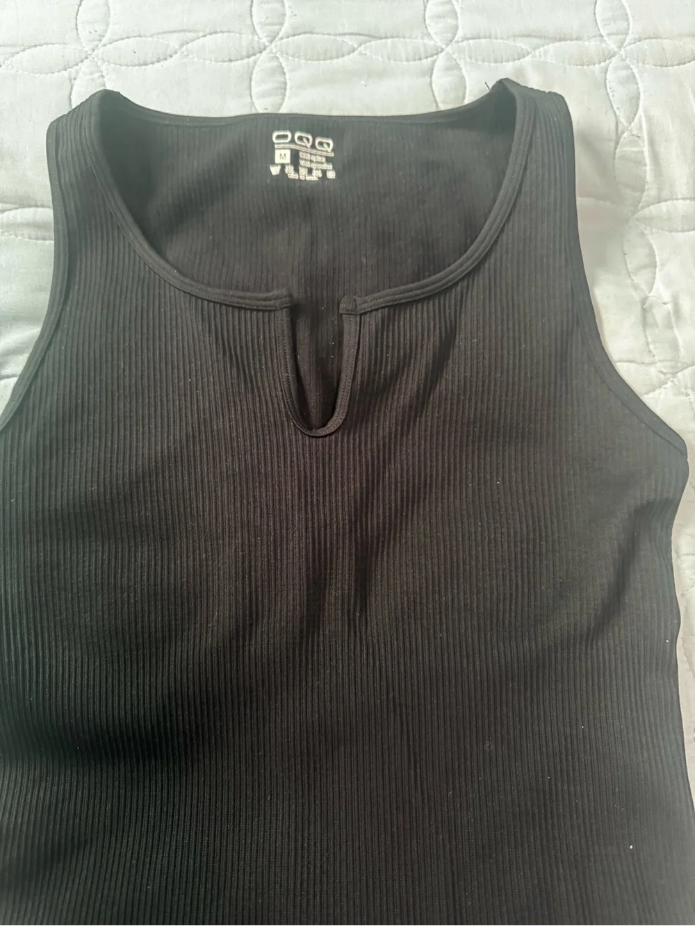 OQQ Black Ribbed One-Piece Bodysuit Sz M